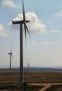 Tiny_people_huge_turbine.jpg
