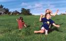Children_nunning_in_grass.JPG